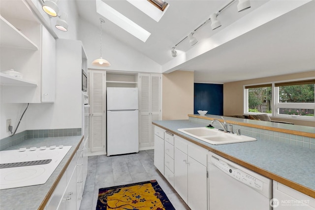 2708 Lynn St, Bellingham, WA 98225 - kitchen featuring white appliances, a sink, a skylight, white cabinets, and open shelves