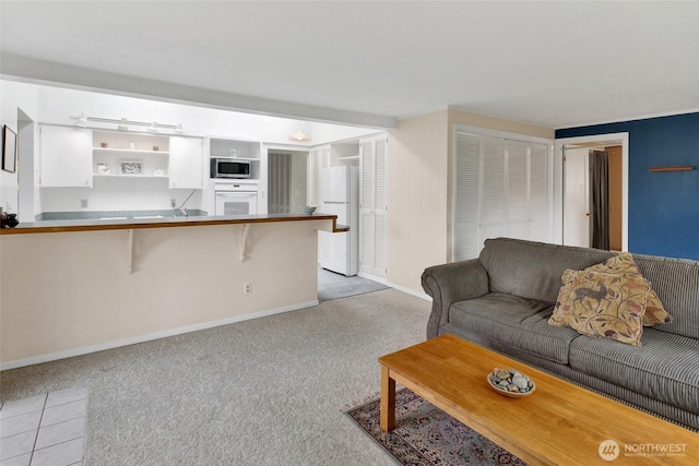2708 Lynn St, Bellingham, WA 98225 - living area featuring light carpet and baseboards