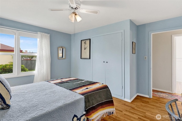 2708 Lynn St, Bellingham, WA 98225 - bedroom with wood finished floors, baseboards, a ceiling fan, and a closet