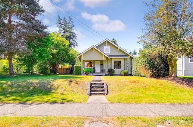 932 N Alder St, Tacoma, WA 98406 - view of front of home featuring covered porch and a front lawn