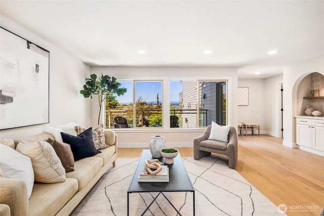 200 James St Unit 206, Edmonds, WA 98020 - living room featuring recessed lighting, light wood-style floors, and baseboards