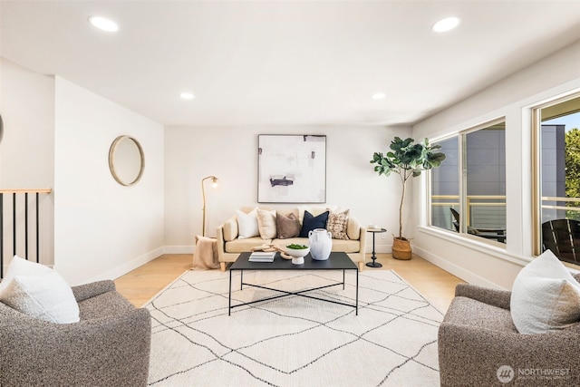 200 James St Unit 206, Edmonds, WA 98020 - living room featuring light wood-style floors, recessed lighting, and baseboards