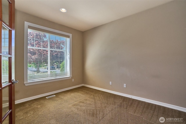27006 229th Pl SE, Maple Valley, WA 98038 - empty room featuring dark colored carpet, baseboards, and recessed lighting