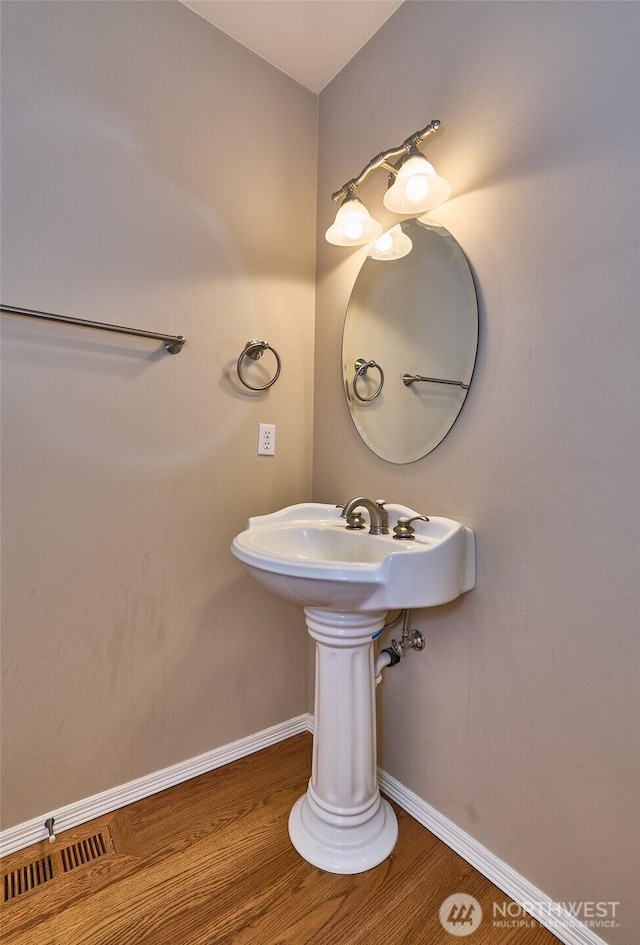 27006 229th Pl SE, Maple Valley, WA 98038 - bathroom with wood finished floors and baseboards