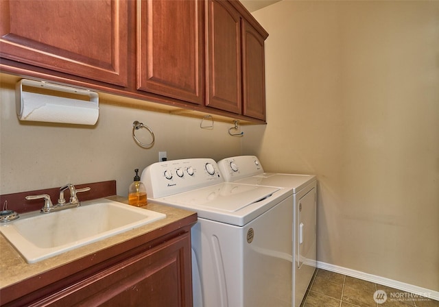 27006 229th Pl SE, Maple Valley, WA 98038 - washroom featuring washing machine and clothes dryer, cabinet space, tile patterned floors, and baseboards