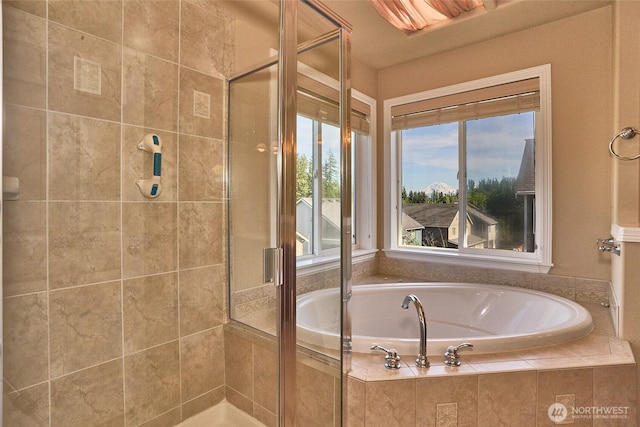 27006 229th Pl SE, Maple Valley, WA 98038 - bathroom with healthy amount of natural light, a garden tub, and a stall shower