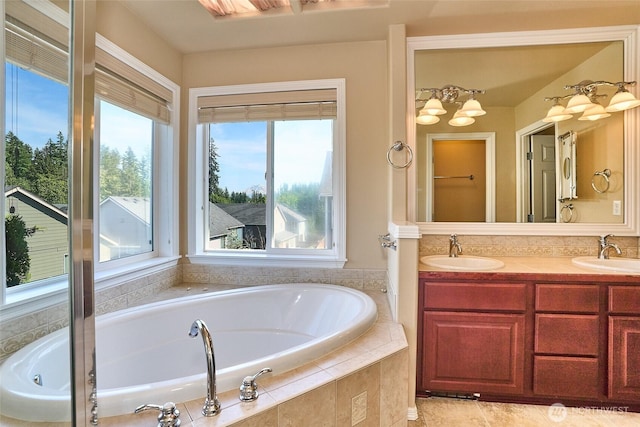 27006 229th Pl SE, Maple Valley, WA 98038 - bathroom featuring plenty of natural light, a bath, and double vanity