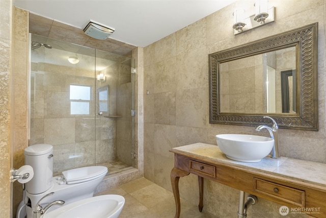 1542 Grand Ave, Seattle, WA 98122 - full bathroom featuring tile walls, toilet, a shower stall, a bidet, and vanity