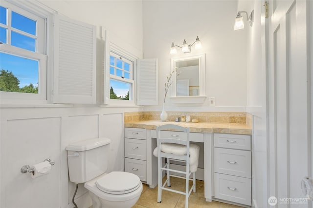 1542 Grand Ave, Seattle, WA 98122 - bathroom featuring toilet, vanity, and tile patterned flooring