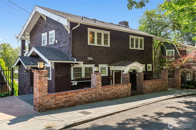 1542 Grand Ave, Seattle, WA 98122 - view of front of home featuring a chimney and a shingled roof