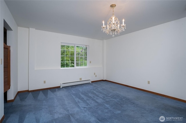 818 295th St E, Roy, WA 98580 - carpeted spare room featuring a baseboard heating unit, a chandelier, and baseboards