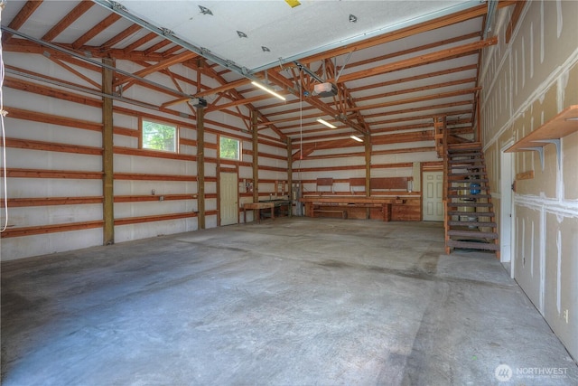 818 295th St E, Roy, WA 98580 - garage featuring a garage door opener
