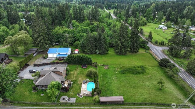 818 295th St E, Roy, WA 98580 - aerial overview of property's location featuring a heavily wooded area
