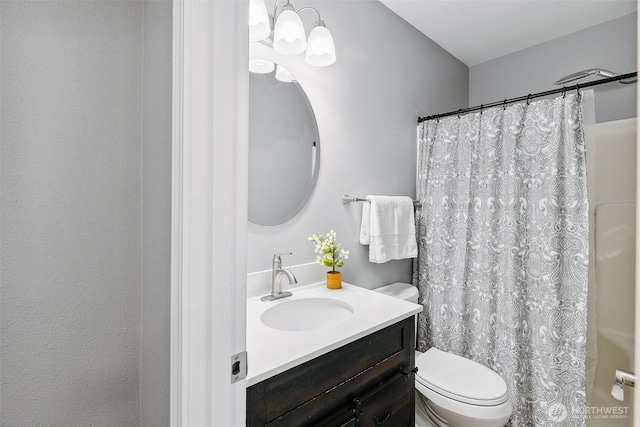 17655 Division Ave NE, Suquamish, WA 98392 - full bathroom with vanity, toilet, a shower with shower curtain, and a chandelier