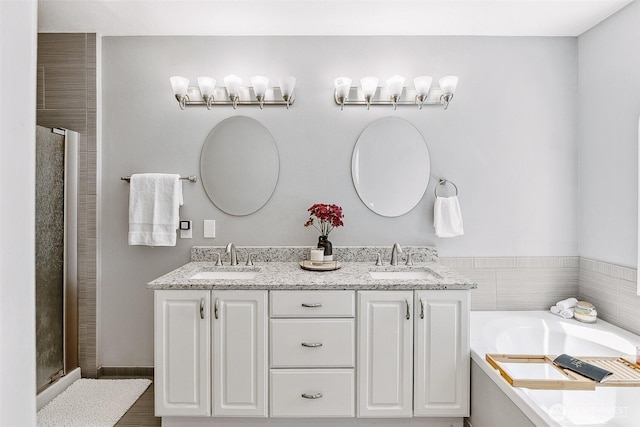 17655 Division Ave NE, Suquamish, WA 98392 - full bath with a shower stall, double vanity, and a garden tub