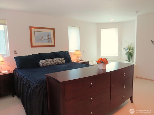 1599 E Ocean Shores Blvd SW Unit 2E, Ocean Shores, WA 98569 - bedroom featuring light colored carpet
