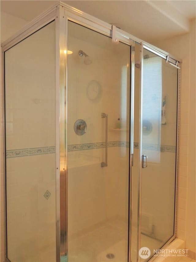1599 E Ocean Shores Blvd SW Unit 2E, Ocean Shores, WA 98569 - full bath featuring a shower stall