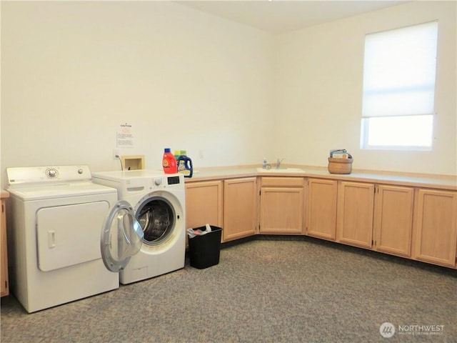 1599 E Ocean Shores Blvd SW Unit 2E, Ocean Shores, WA 98569 - washroom with independent washer and dryer, cabinet space, and dark colored carpet