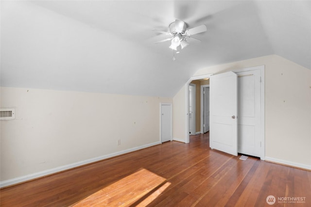 2649 Louisiana St, Longview, WA 98632 - bonus room with a ceiling fan, lofted ceiling, wood-type flooring, and baseboards