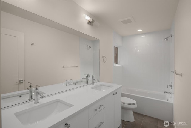 9223A 14th Ave NW, Seattle, WA 98117 - full bath with toilet, double vanity, bathtub / shower combination, and tile patterned flooring