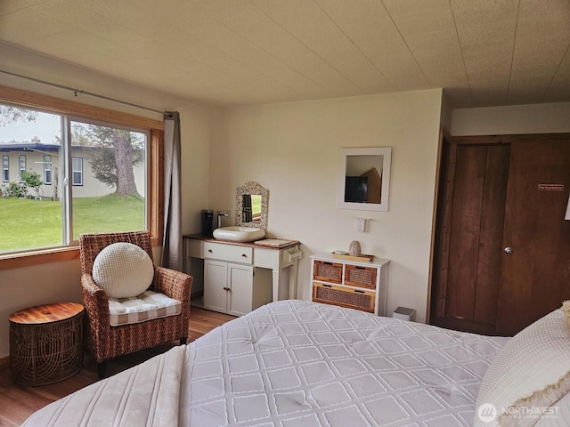 211 NW 25th St, Long Beach, WA 98631 - bedroom featuring wood finished floors