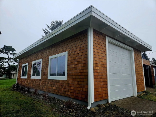 211 NW 25th St, Long Beach, WA 98631 - view of side of home featuring an attached garage