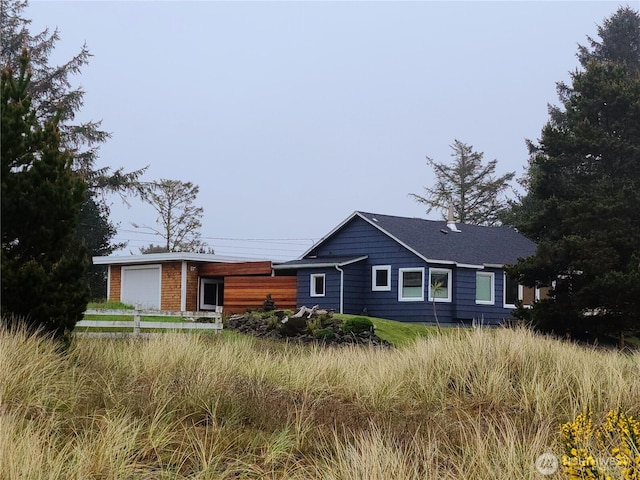 211 NW 25th St, Long Beach, WA 98631 - view of front of house with a garage