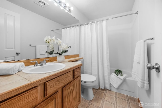 1009 112th St SE Unit B106, Everett, WA 98208 - bathroom with vanity, toilet, and shower / tub combo with curtain