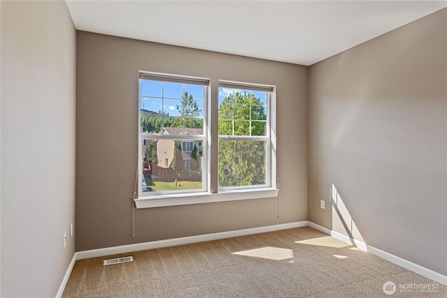 19333 205th St E, Orting, WA 98360 - carpeted spare room featuring baseboards