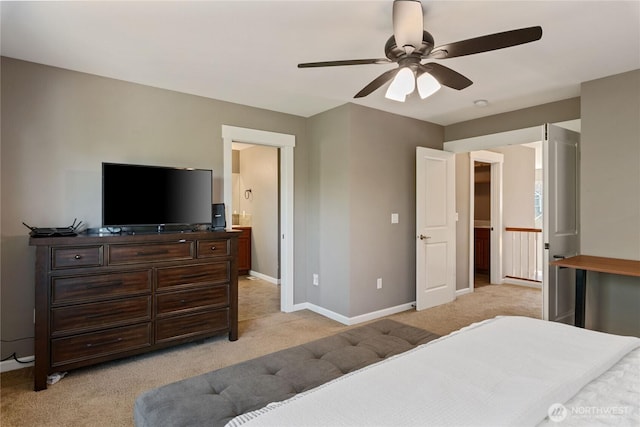 19333 205th St E, Orting, WA 98360 - bedroom featuring light colored carpet, baseboards, ensuite bath, and a ceiling fan