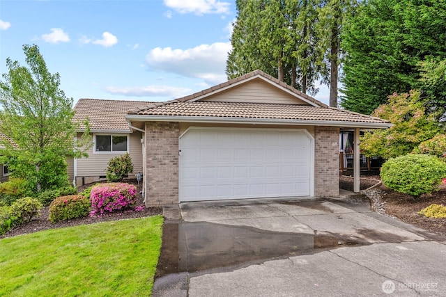 8 Clearview Dr, Longview, WA 98632 - ranch-style house with a tiled roof, brick siding, concrete driveway, and a garage