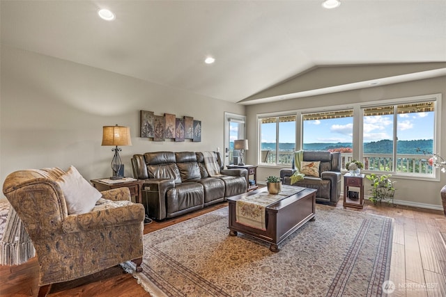 8 Clearview Dr, Longview, WA 98632 - living room with vaulted ceiling, wood finished floors, recessed lighting, and baseboards