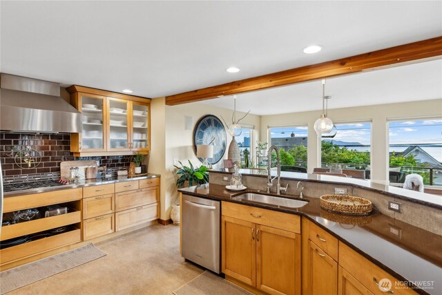 714 13th St, Bellingham, WA 98225 - kitchen with a sink, appliances with stainless steel finishes, wall chimney exhaust hood, beam ceiling, and decorative backsplash