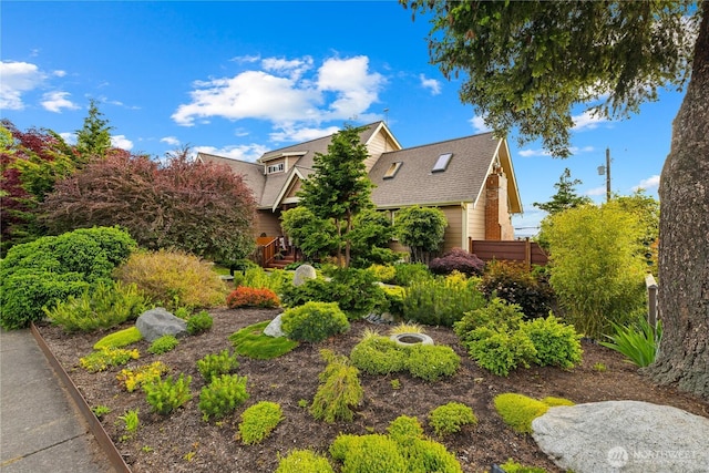 714 13th St, Bellingham, WA 98225 - view of property hidden behind natural elements featuring a shingled roof