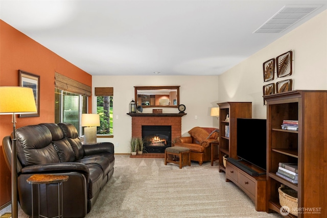 2041 NW Tregaten Ln, Poulsbo, WA 98370 - living area with light colored carpet and a fireplace