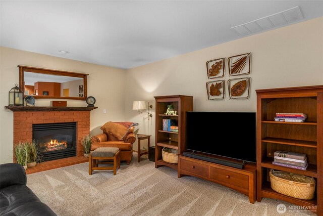 2041 NW Tregaten Ln, Poulsbo, WA 98370 - living area with carpet and a fireplace
