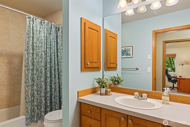 2041 NW Tregaten Ln, Poulsbo, WA 98370 - bathroom featuring vanity, toilet, and shower / bath combo