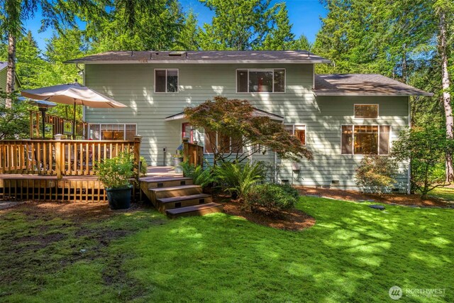 2041 NW Tregaten Ln, Poulsbo, WA 98370 - back of property featuring a lawn and a wooden deck