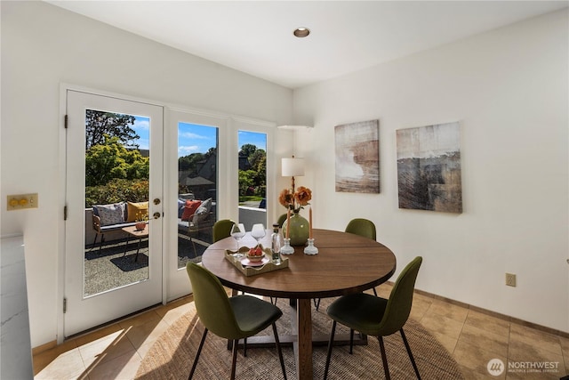 3249 Conkling Pl W, Seattle, WA 98119 - dining space with light tile patterned floors and baseboards