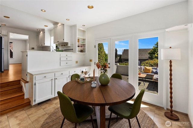 3249 Conkling Pl W, Seattle, WA 98119 - dining area with light tile patterned floors, baseboards, and recessed lighting