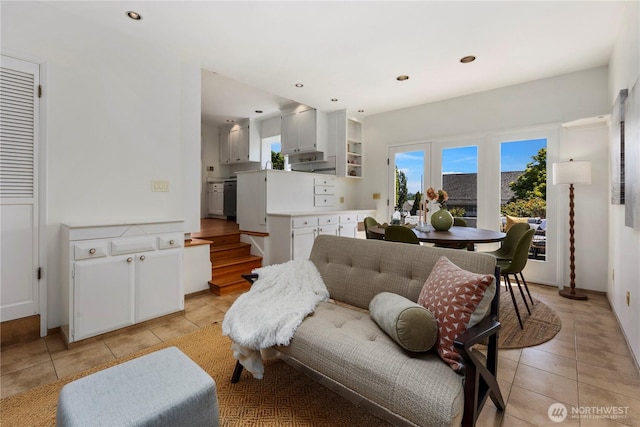 3249 Conkling Pl W, Seattle, WA 98119 - living area featuring light tile patterned floors, recessed lighting, and stairway