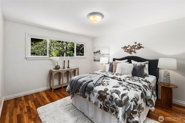 3249 Conkling Pl W, Seattle, WA 98119 - bedroom featuring baseboards and wood finished floors
