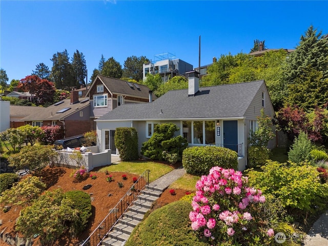 3249 Conkling Pl W, Seattle, WA 98119 - view of front facade featuring a chimney and a shingled roof