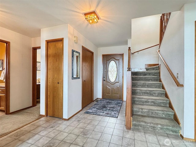 1813 E 3rd St, Port Angeles, WA 98362 - foyer featuring stairway, baseboards, and light tile patterned flooring