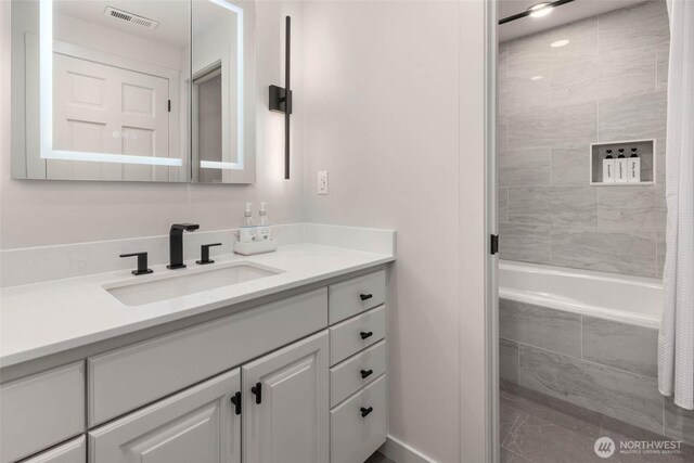 12 Columbia Ky, Bellevue, WA 98006 - bathroom with vanity and tiled shower / bath combo