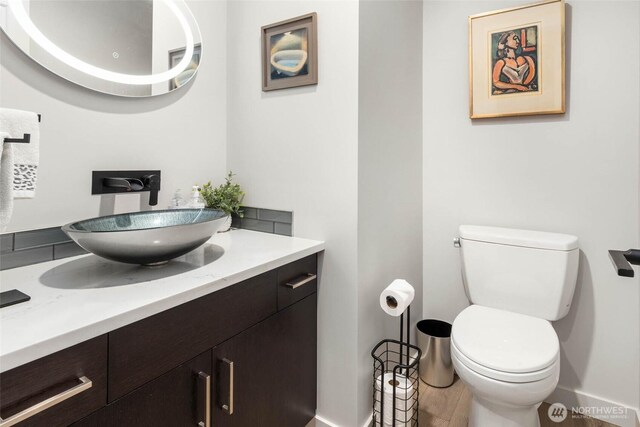 12 Columbia Ky, Bellevue, WA 98006 - half bath featuring vanity, toilet, and baseboards