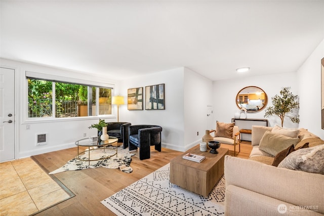 3834 175th Ave NE Unit 101, Redmond, WA 98052 - living room featuring light wood-style floors and baseboards