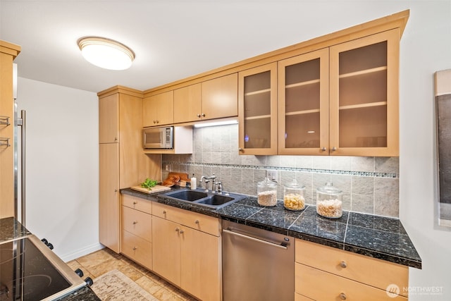 3834 175th Ave NE Unit 101, Redmond, WA 98052 - kitchen with stainless steel dishwasher, white microwave, tile countertops, light brown cabinetry, and backsplash