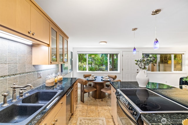 3834 175th Ave NE Unit 101, Redmond, WA 98052 - kitchen with electric range, backsplash, hanging light fixtures, glass insert cabinets, and dishwasher