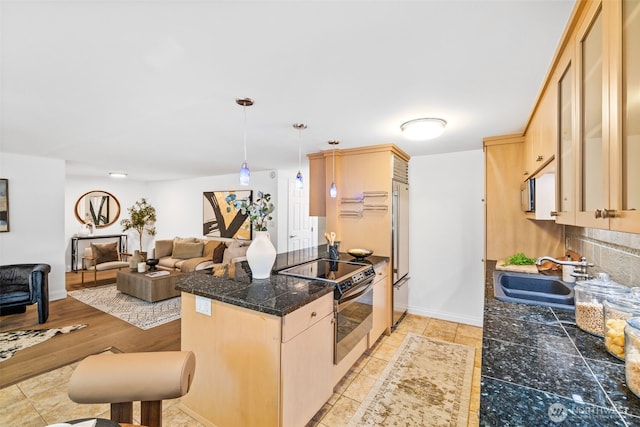 3834 175th Ave NE Unit 101, Redmond, WA 98052 - kitchen featuring electric range, tile countertops, a peninsula, high quality fridge, and light brown cabinetry
